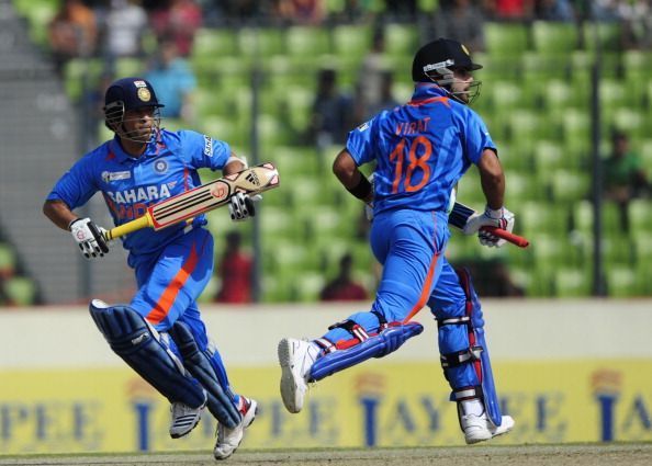 Indian batsman Sachin Tendulkar (L) and