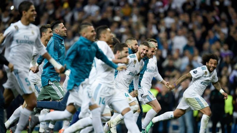 Real Madrid players celebrate their passage to the finals for the third consecutive time