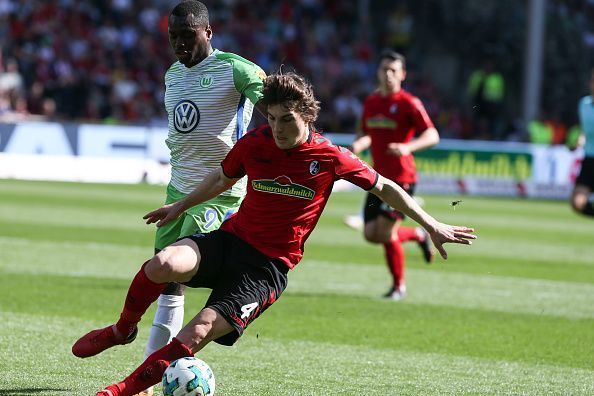 Soyuncu Caglar (R) and Dimata Landry Nany (L) seen during...