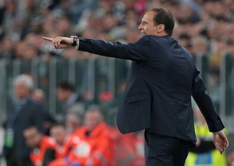 Allegri shouts orders to his players from the touchline