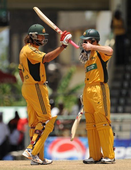 Australian cricketer Andrew Symonds (L)