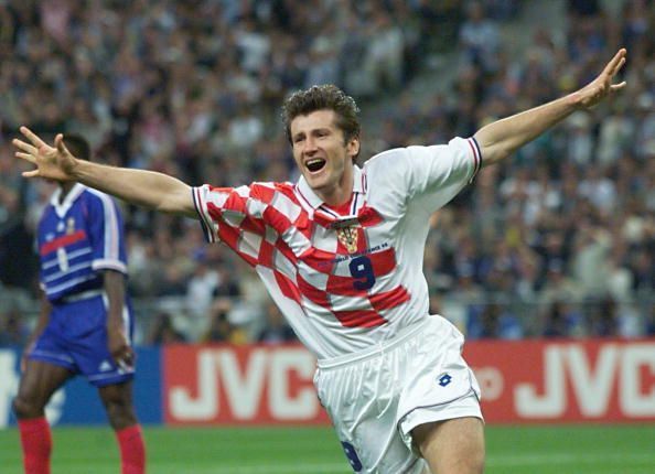 Croatian forward Davor Suker jubilates after scori