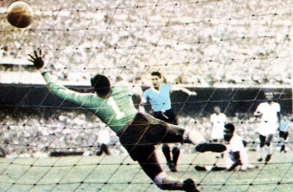 World Cup Final, 1950. Brazil. Maracana Stadium, Rio De Jainero. Brazil 1 v Uruguay 2. 16th July, 1950. Juan Schiaffino scores Uruguay&#039;s first goal past Brazilian keeper Barbosa.