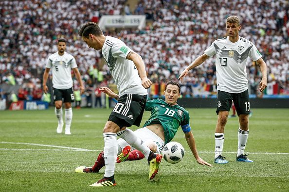 Mesut Ozil, Andres Guardado (C) and Thomas Muller during the...
