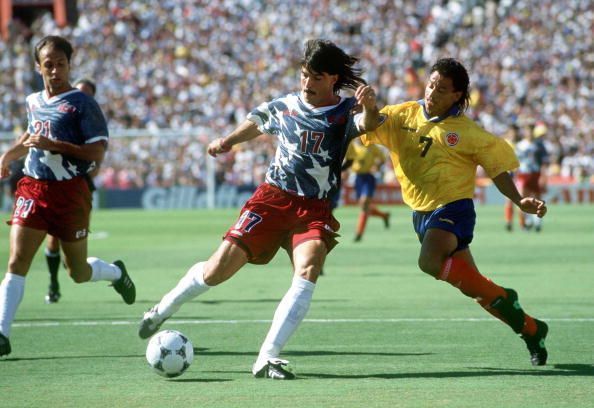 1994 World Cup Finals. Pasadena USA. 22nd June, 1994. USA 2 v Colombia 1. USA&#039;s Marcel Balboa clears the ball from Colombia&#039;s De Avila