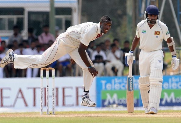 West Indies cricketer Andre Russell (L)