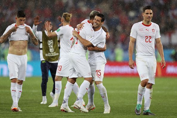 Switzerland come from behind to clinch their first win of the tournament