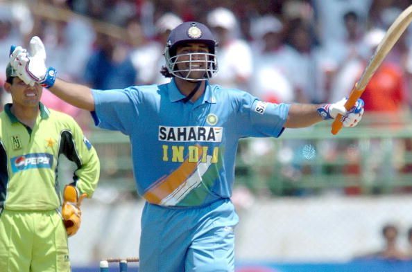Indian cricketer Mahender Dhoni celebrat