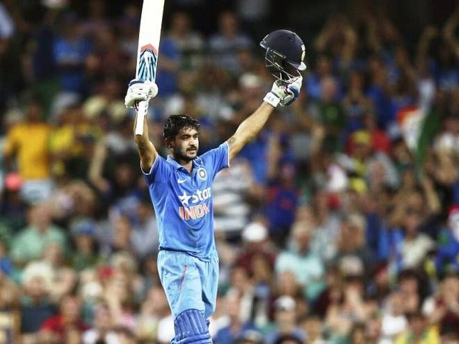 Pandey celebrating his maiden century against Australia