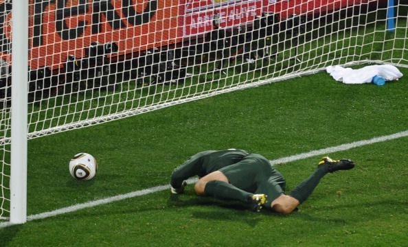 England&#039;s goalkeeper Robert Green misses