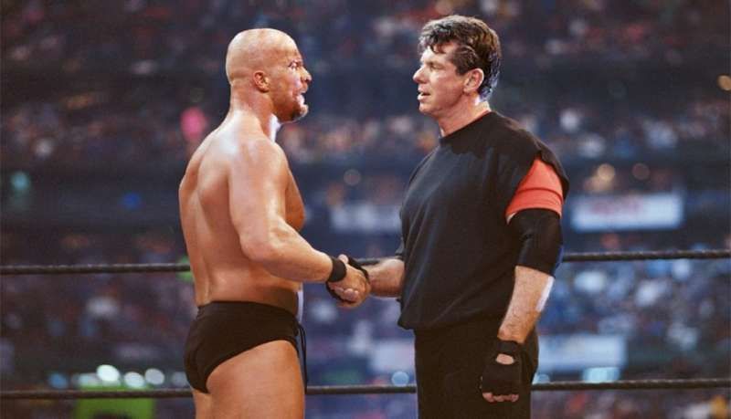 &#039;Stone Cold&#039; shaking hands with Mr. McMahon 