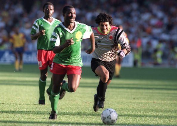 Forward Roger Milla from Cameroon runs past Colomb