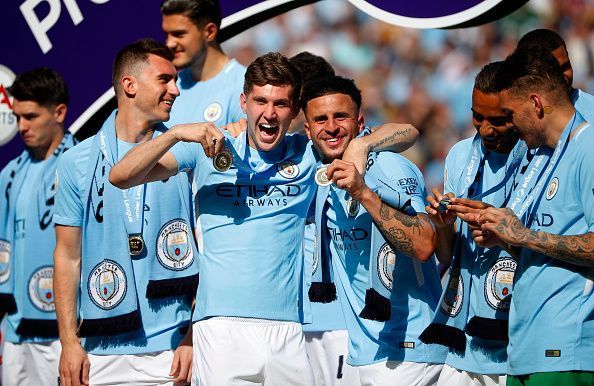 Manchester City players celebrating.