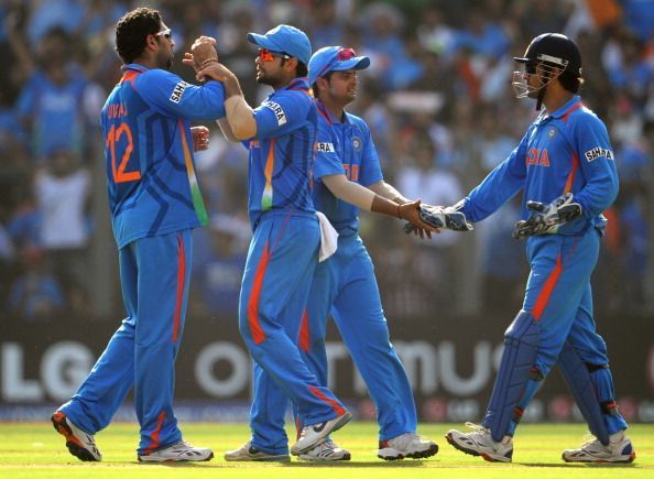 Indian spinner Yuvraj Singh (L) is congr