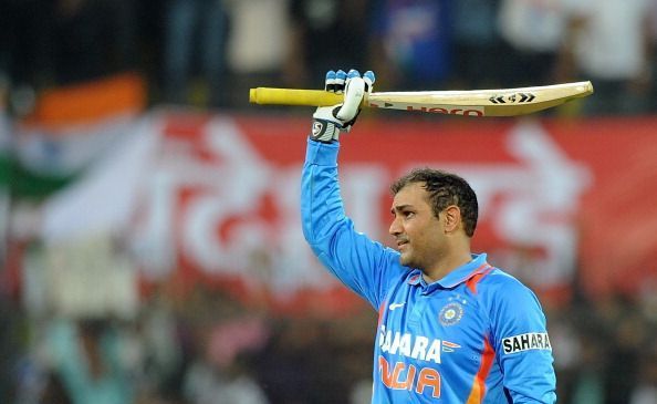 Indian batsman Virender Sehwag celebrate