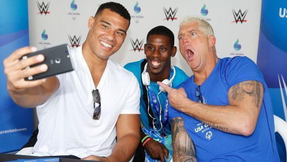 Jason Jordan and Goldust with a fan