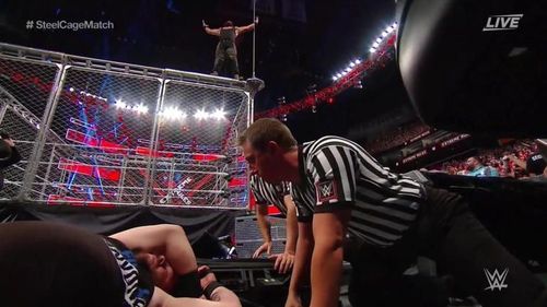 Image result for wwe kevin owens thrown from steel cage