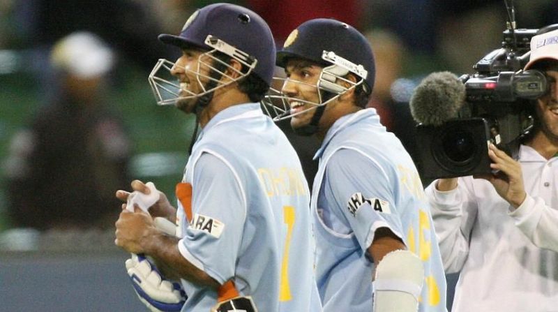 MS Dhoni and Rohit Sharma walk off the ground after completing a five-wicket victory