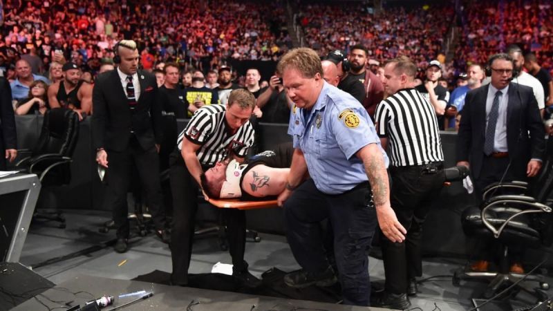 Image result for wwe kevin owens thrown from steel cage