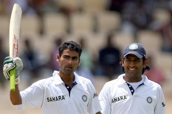 Indian cricketer Mhendra Singh Dhoni(R)