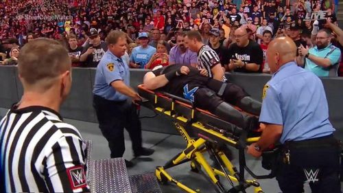 Kevin Owens taken to a medical facility after being thrown off the steel cage by Strowman