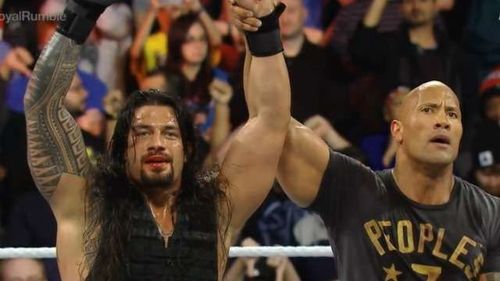 The Rock Celebrating With Reigns after he won the 2015 Royal Rumble