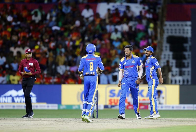 Man of the Match Rahil Shah (middle) bowled well to restrict Chepauk