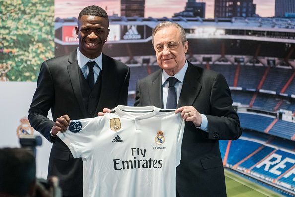 Real Madrid's new Brazilian forward Vinicius and president...