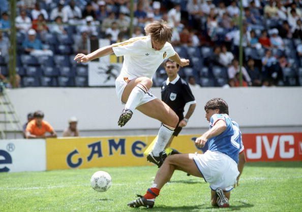 1986 World Cup Third Place Play Off, Puebla, Mexico, 28th June, 1986, France 4 v Belgium 2, Belgium&#039;s Nico Claesen jumps over the challenge of France&#039;s Manuel Amoros