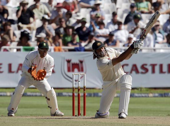 Australian batsman Andrew Symmonds (R) b