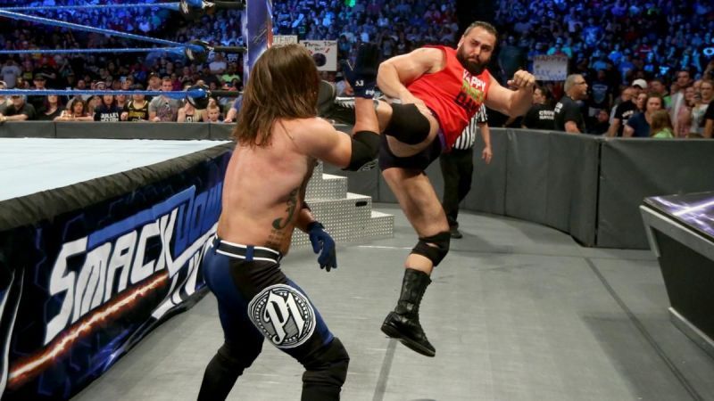 Rusev superkicks Styles