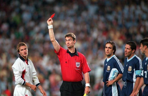 World Cup 1998 Finals, St. Etienne, France. 30th June, 1998. England 2 v Argentina 2 (Argentina win 4-3 on penalties). Referee Kim Milton Nielsen sends off England's David Beckham for kicking out at Diego Simeone.