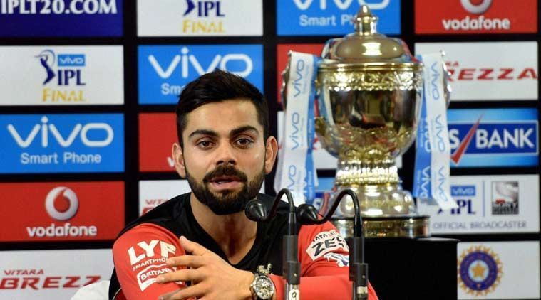 Image result for Virat Kohli with IPL cup