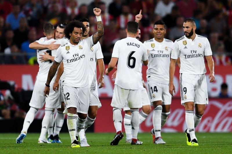 Real Madrid climb to the top of the table