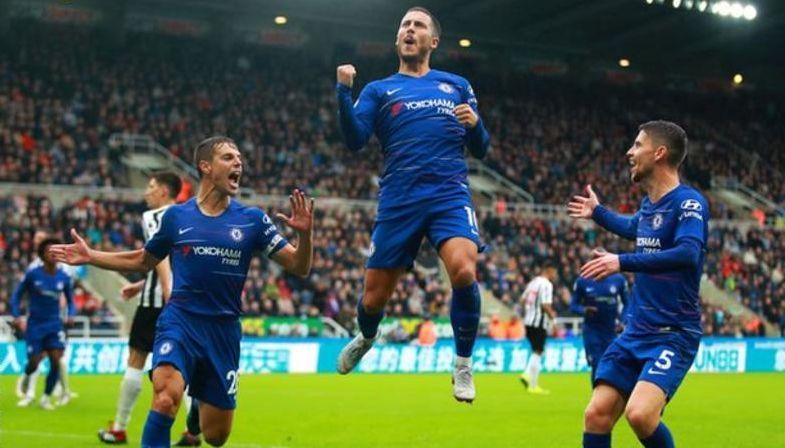 Eden Hazard celebrates his sublime goal from the spot to give Chelsea the lead