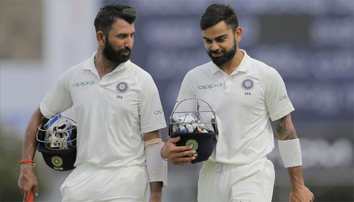 Image result for Pujara and Kohli.