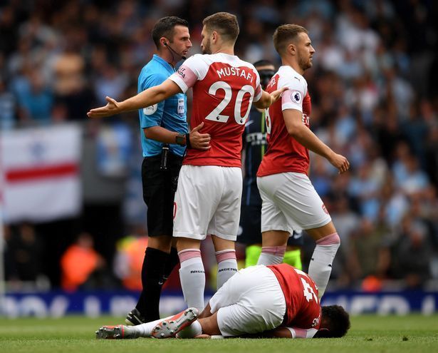 Enter captionShkodran Mustafi talks to referee Michael Oliver