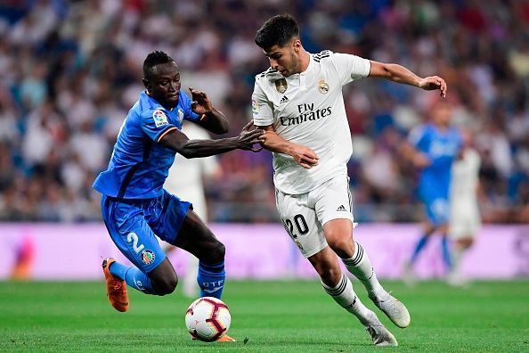 Djene struggled to keep the Real Madrid attackers at bay