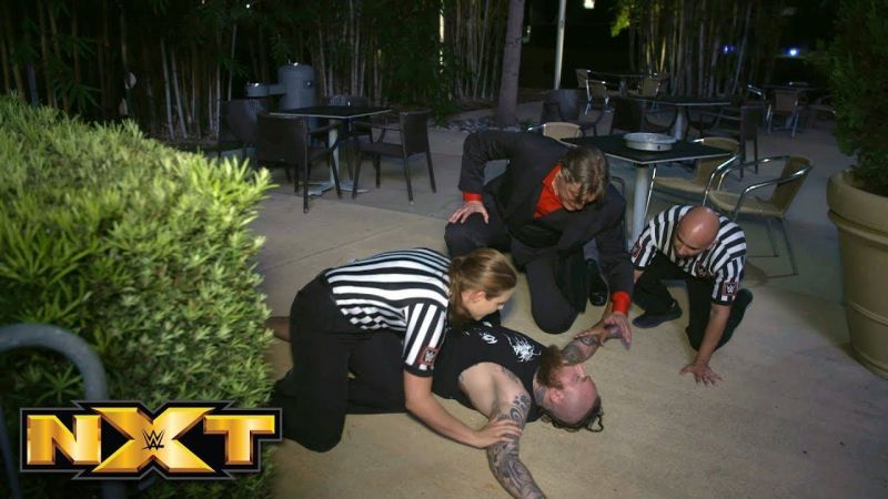 Aleister Black unconscious.