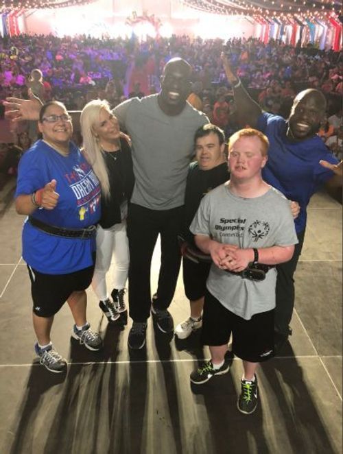 Titus O'Neil and fellow Titus Worldwide members doing what they do best--spreading happiness!