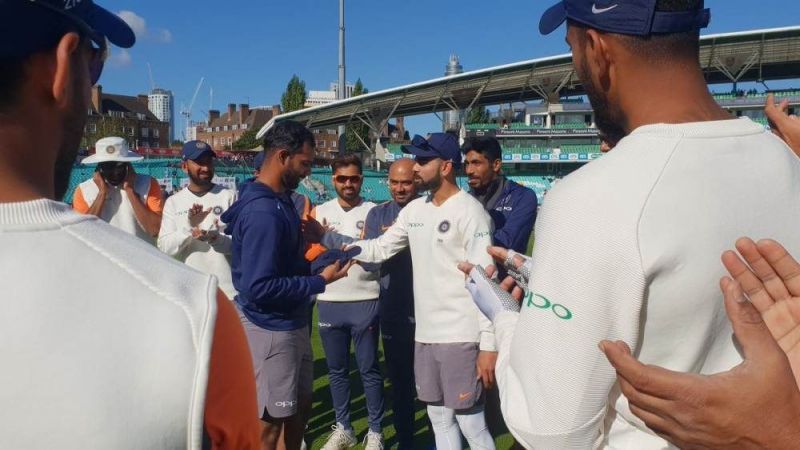 Hanuma Vihari gets the test cap from Virat Kohli