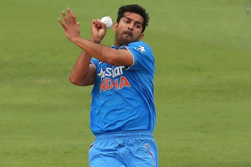 Mohit Sharma bowling in a match