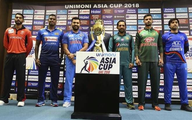 The captains with the Asia Cup