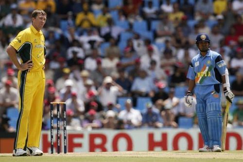 Glenn McGrath of Australia and Sachin Tendulkar of India look on