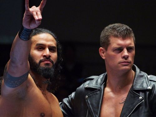 Tama Tonga (left) with Cody Rhodes 