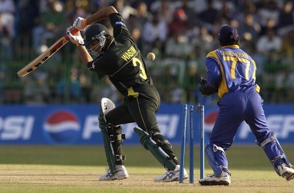 COLOMBO - SEPTEMBER 12:  Wasim Akram of Pakistan is bowled out during the Sri Lanka v Pakistan openi