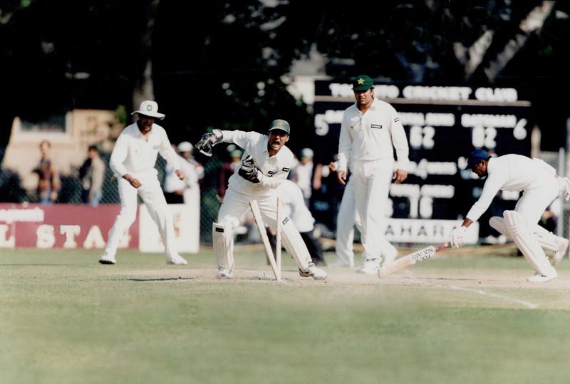 Vinod Kambli is short of the crease as Moin Khan rips off the bails from an Ijaz Ahmed throw