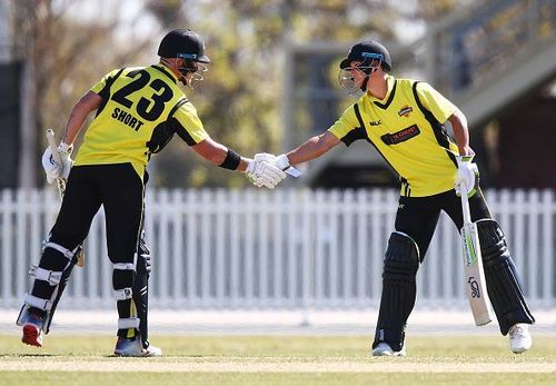 D'Arcy Short shaking hands with his partner