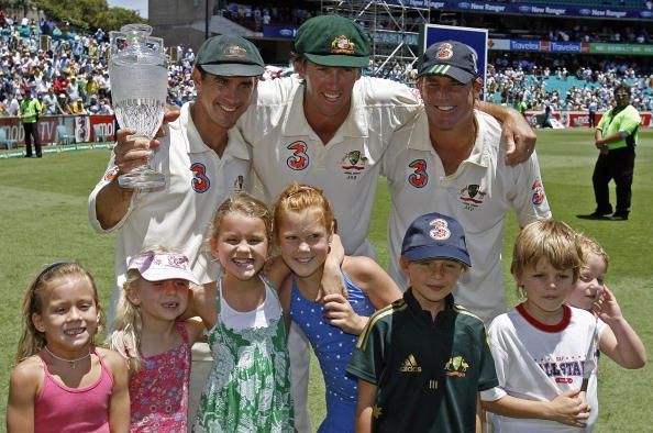  Retiring opening batsman for Australia, Justin Langer (L), retiring pace bowler Glenn McGrath (C), and retiring spin bowler Shane Warne (R) display the Ashes trophy with their children after winning the fifth and final Ashes Test at the Sydney Cricket Ground, 05 January 2007.