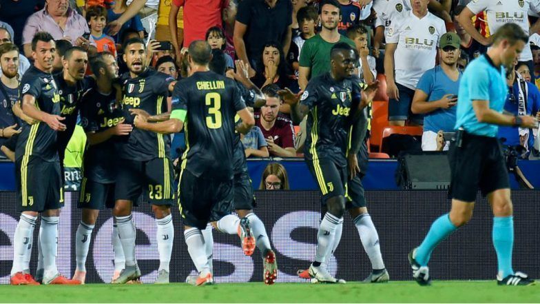 Juventus players celebrate after Pjanic opened the scoring against valencia